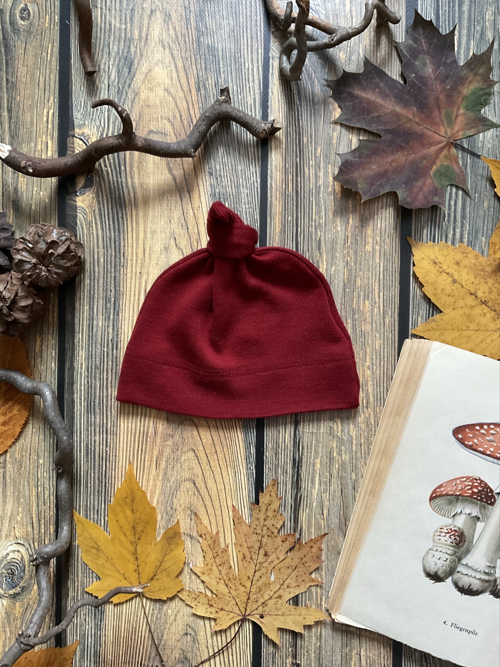 Knotenmütze Merino rot